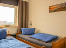Strandhochhaus 12 - Schlafzimmer - Cuxland-Fewo-Service
